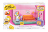 The Simpsons Homer Living Room Diorama toy set in its original retail packaging, featuring a pink and orange living room scene with Homer Simpson, a purple TV, and a small house accessory.