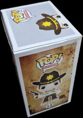 Funko Pop! The Walking Dead: Rick Grimes #13 (Sun Damage & Rip on Corner )