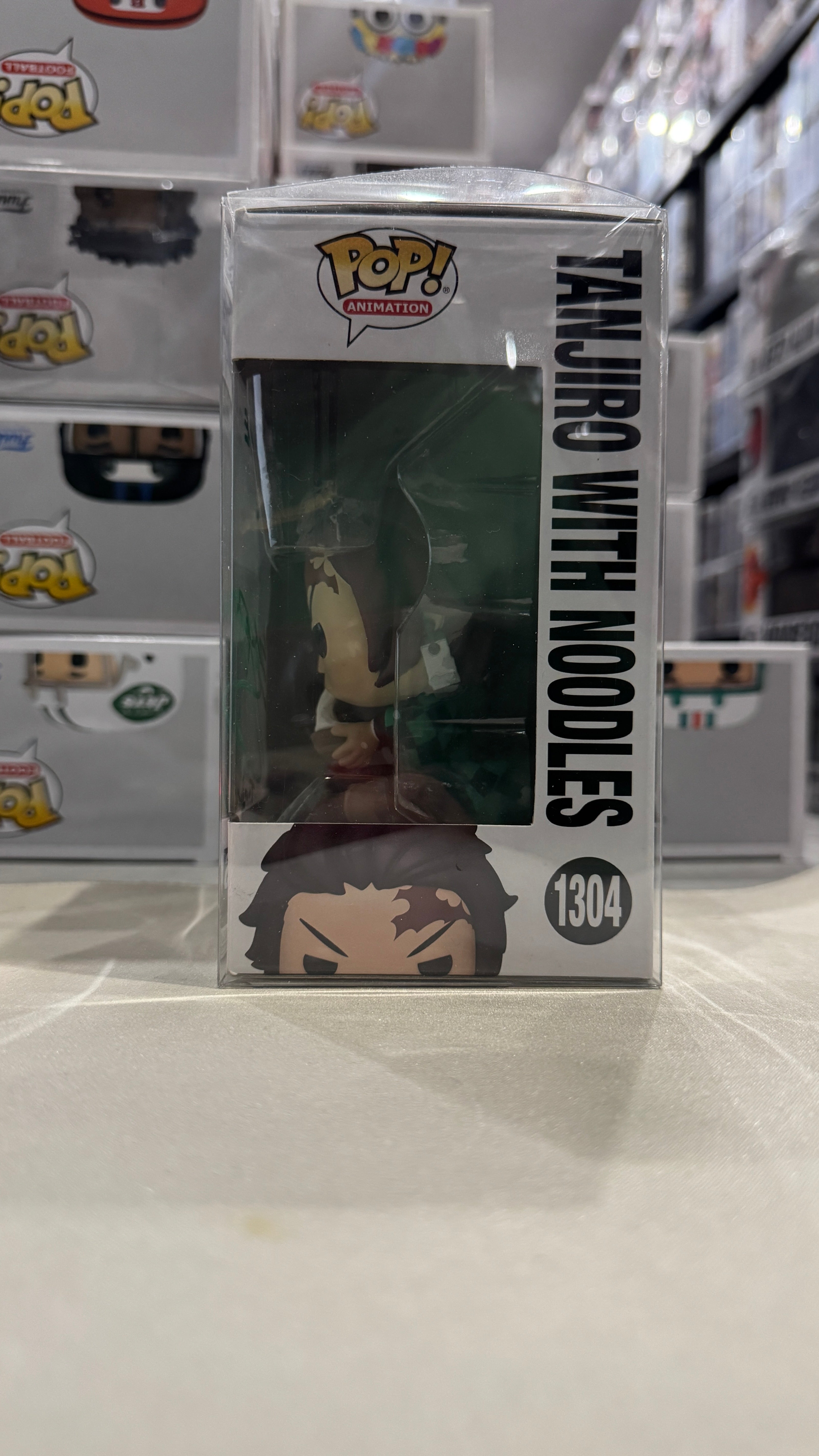 Funko Pop! Tanjiro Kamado With Noodles #1304 Signed by Zach Aguilar with Quote