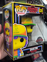 Funko Pop! Stranger Things: Dustin (Black Light) (Funko Special Edition) #828 (rip on corner)