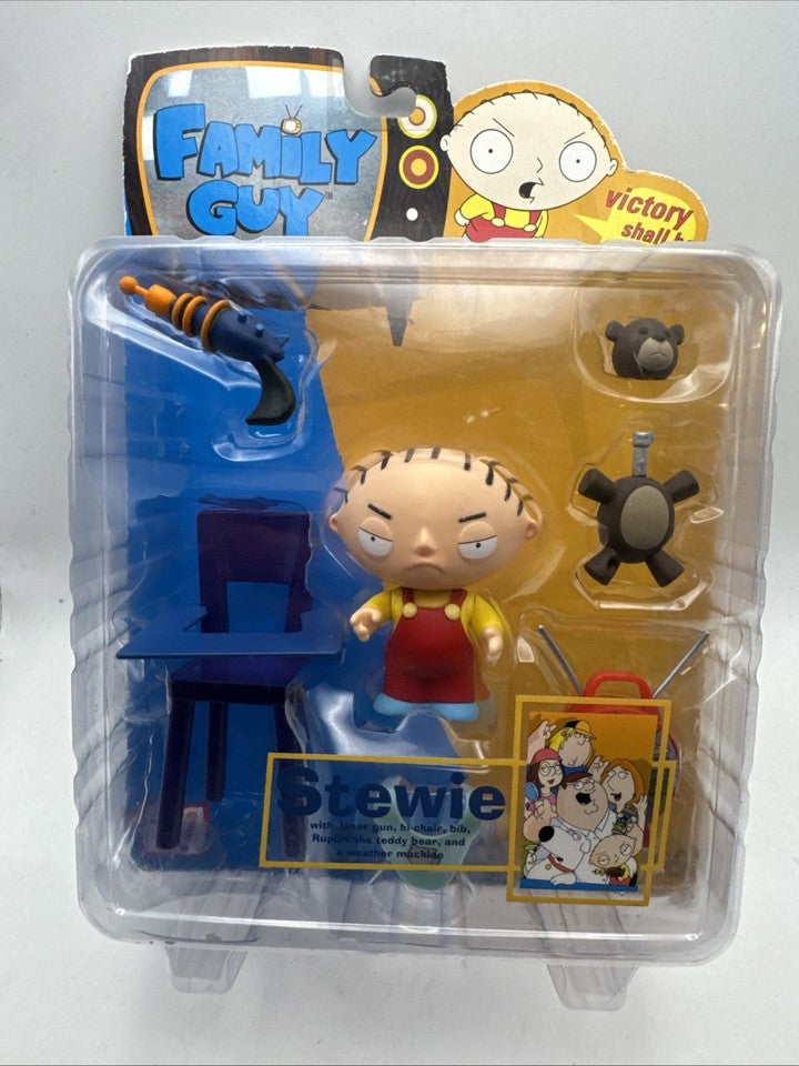 Mezco Toyz: Family Guy Stewie with laser gun, hi-chair, bib, Rupert the teddy bear, and a weather machine